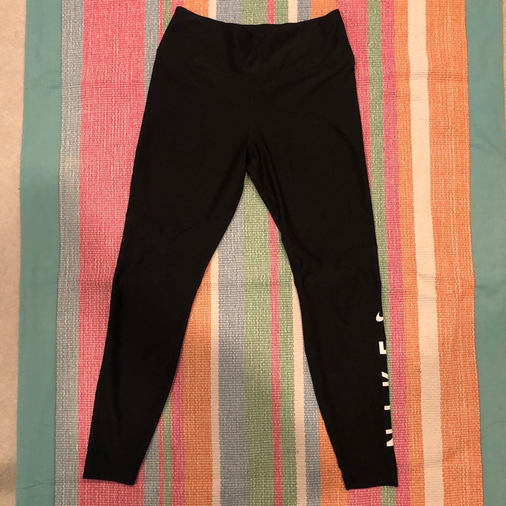nike dry fit leggings with nike logo on the side
